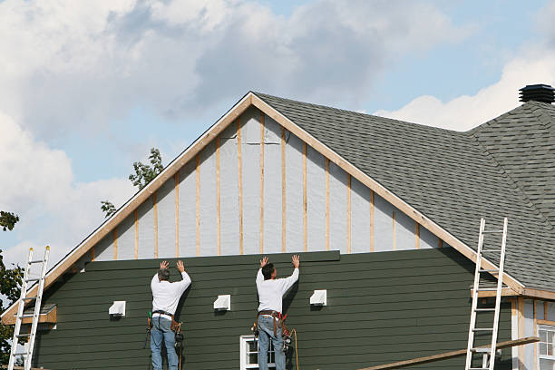 Professional Siding technician working in New Paris, OH